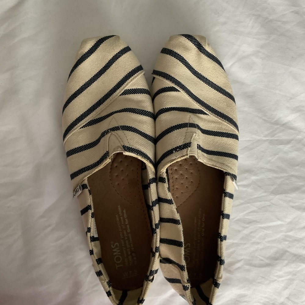 Tom’s. Slip on.